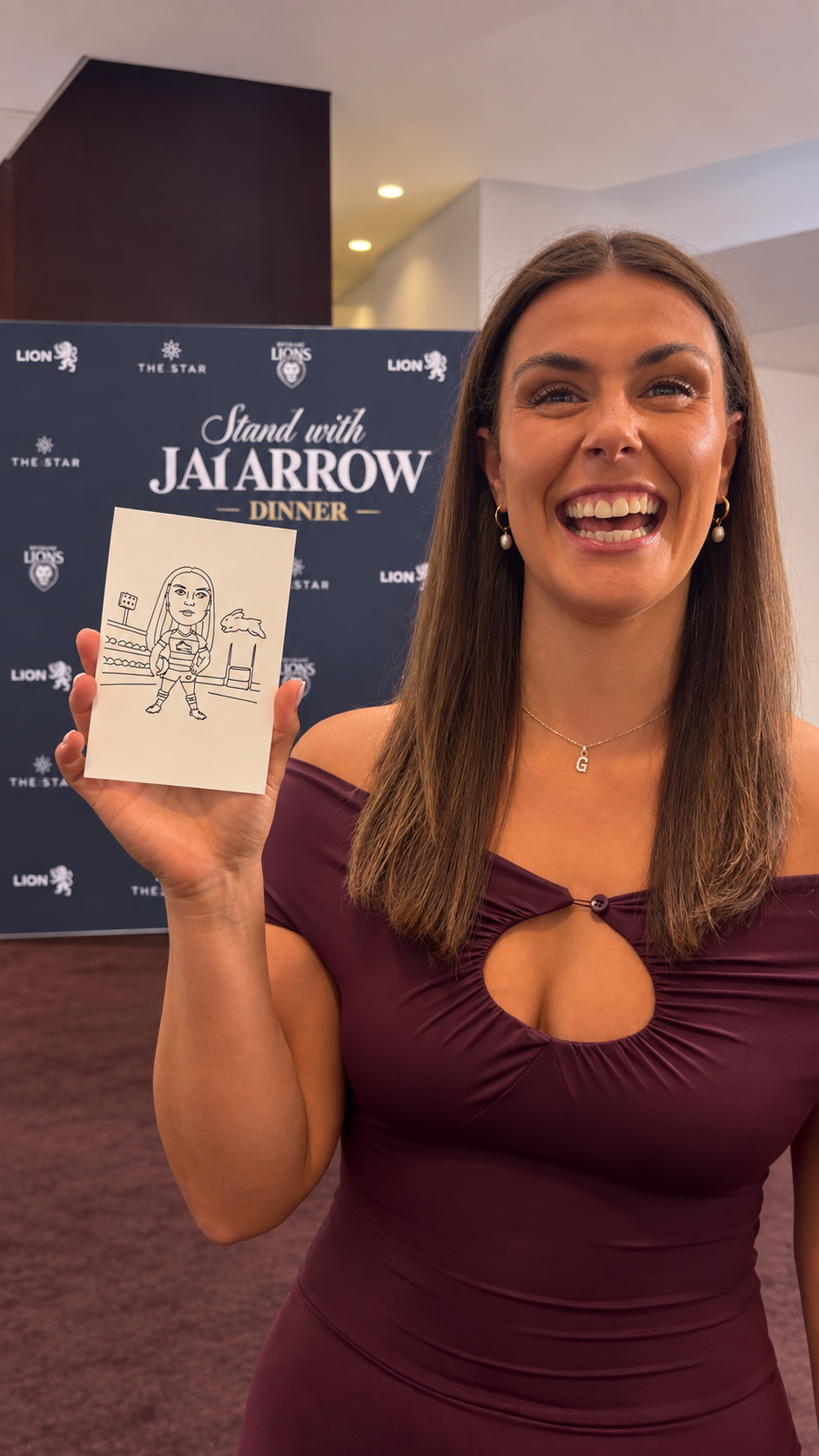 Guest holding a portrait drawn by Blazebot 2