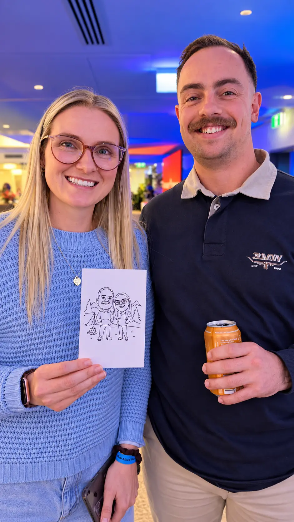Guest holding a portrait drawn by Blazebot 1
